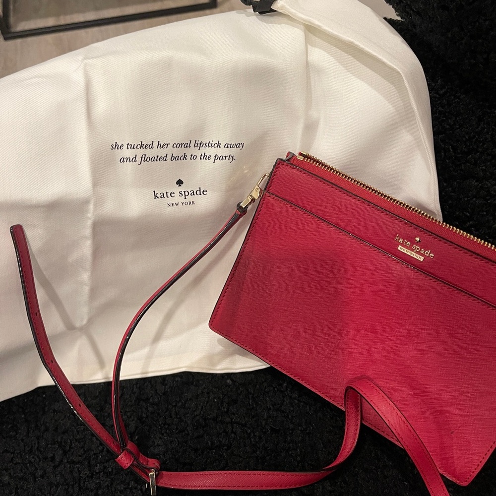 Kate Spade Red Clutch with Modern Design